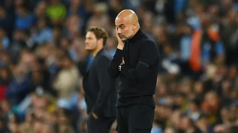 MANCHESTER, ENGLAND - SEPTEMBER 14: Pep Guardiola, Manager of Manchester City looks dejected during the UEFA Champions League group G match between Manchester City and Borussia Dortmund at Etihad Stadium on September 14, 2022 in Manchester, England. (Photo by Michael Regan/Getty Images)