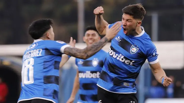 Felipe Loyola grita ante O’Higgins su primer gol en la máxima categoría del fútbol chileno. (Marco Vásquez/Photosport).