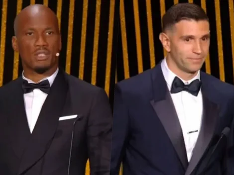 Drogba le pone un paraguas al Dibu ante lluvia de pifias en Francia