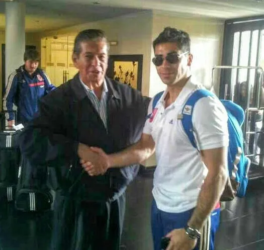 Enrique Maluenda con Johnny Herrera.