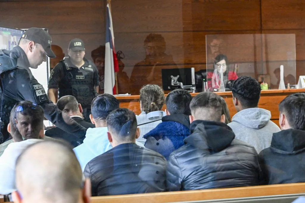 La formalización de nueve ex cadetes de Cobreloa por una presunta violación grupal ocurrida en 2021 en las inmediaciones de la Casa Naranja en Calama y que fue denunciada por una joven. | Foto: Photosport.