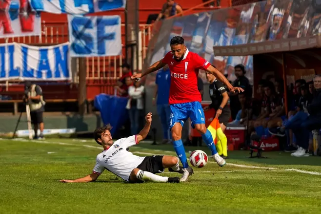 Chiqui Bouzat marca al Huaso Isla. (Foto: Guille Salazar).