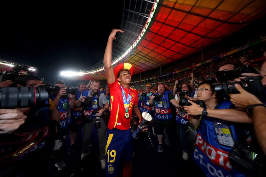 BERLIN, GERMANY – JULY 14: Lamine Yamal of Spain celebrates with his winners medal and ‘Best Young Player’ award after victory over England in the UEFA EURO 2024 final match between Spain and England at Olympiastadion on July 14, 2024 in Berlin, Germany. (Photo by Richard Pelham/Getty Images)