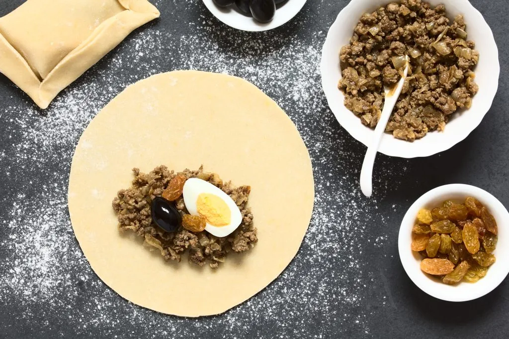 Preparing Chilean Empanada de Pino, 13.10.2020, Copyright: xildix Panthermedia26962793