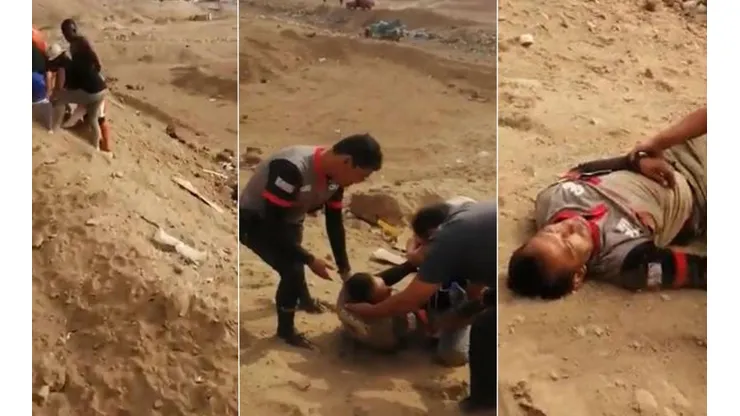El árbitro acostado en el desierto mientras es asistido por gente local