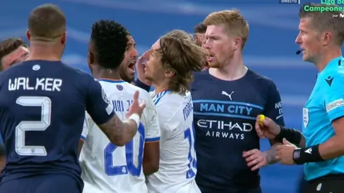 Modric recibe un manotazo de Laporte