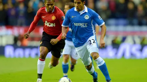 Jean Beausejour jugó cuatro temporadas en el fútbol inglés, con las camisetas de Wigan Athletic y Birmingham City