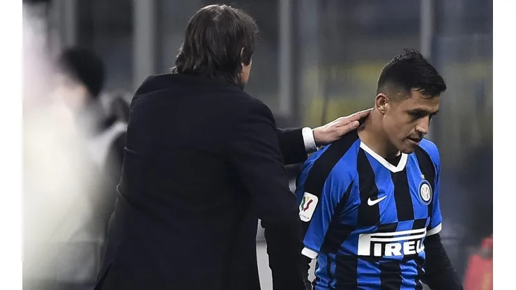 Antonio Conte y Alexis Sánchez.