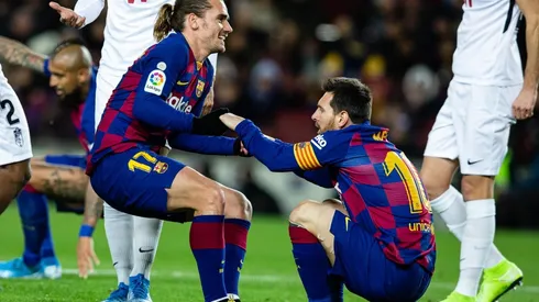 Antoine Griezmann junto a Lionel Messi