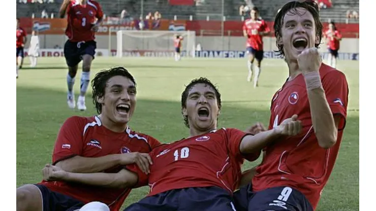 Grondona, Arenas y Medina festejando un gol.