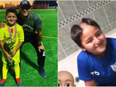 Chupete Suazo juguetea con el pelo de su hijo antes de dejarlo calvo