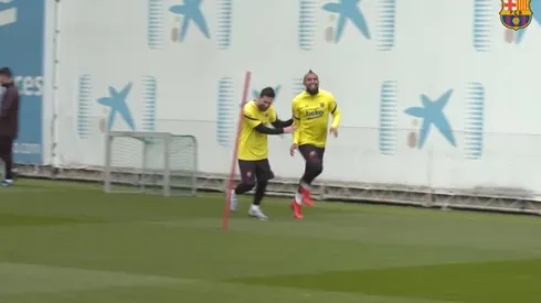 Vidal y Messi en el entrenamiento del Barça.
