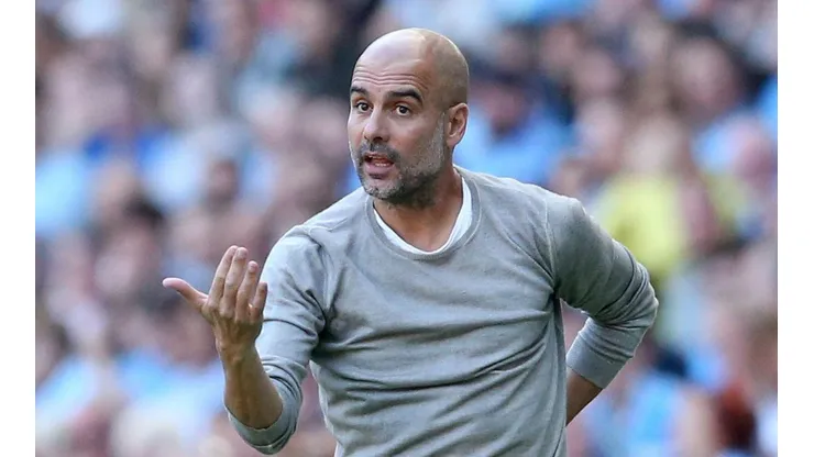 Josep Guardiola en la banca del Manchester City
