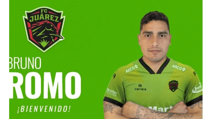 Romo posando con su nueva camiseta.
