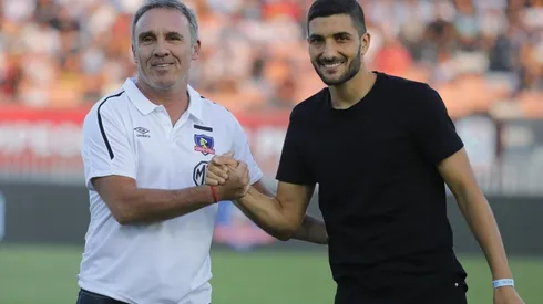 Blandi en la cancha del Monumental con Marcelo Espina.