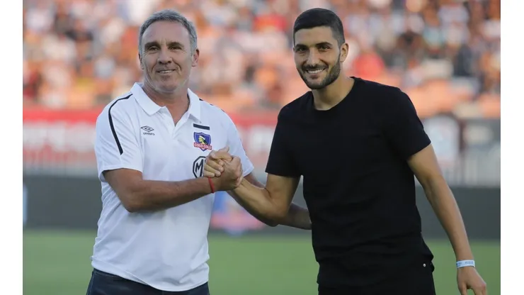 Blandi en la cancha del Monumental con Marcelo Espina.