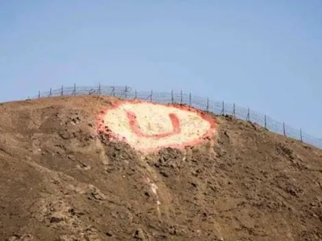 Hinchas de Alianza Lima pintan la insignia de Universitario