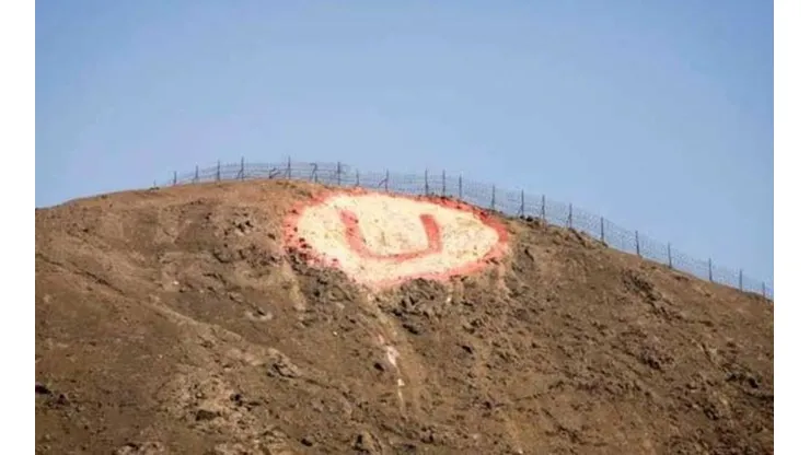 Hinchas de Alianza Lima pintan la insignia de Universitario