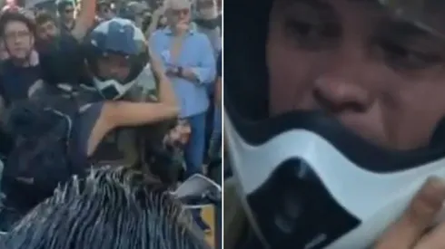 El momento en que el efectivo policial llora.