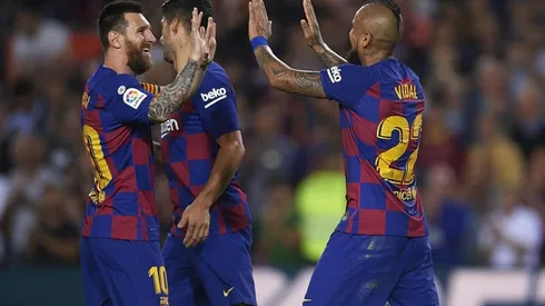 Vidal y Messi en el Barça.