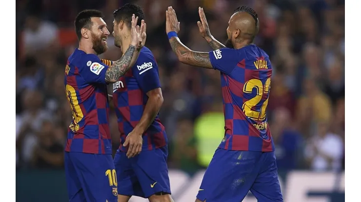 Vidal y Messi en el Barça.