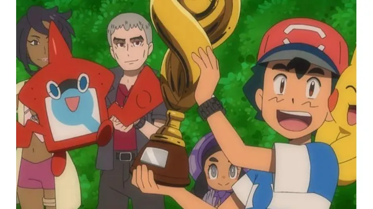 Ash con su trofeo.