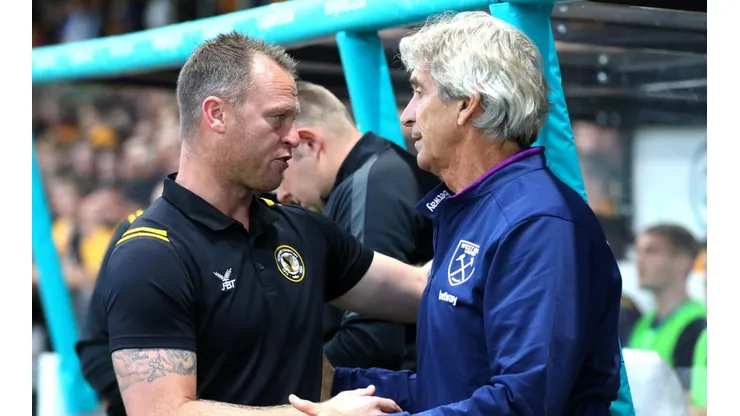 Pellegrini y el DT del County.