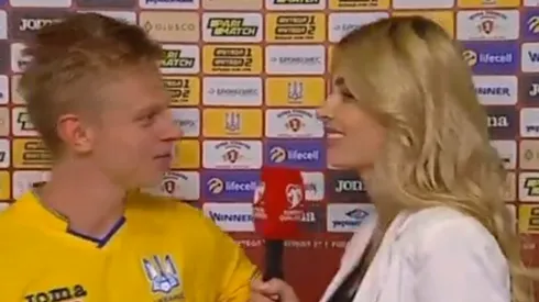 Zinchenko antes de besar a la reportera.