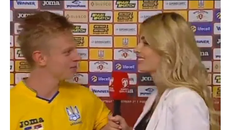 Zinchenko antes de besar a la reportera.