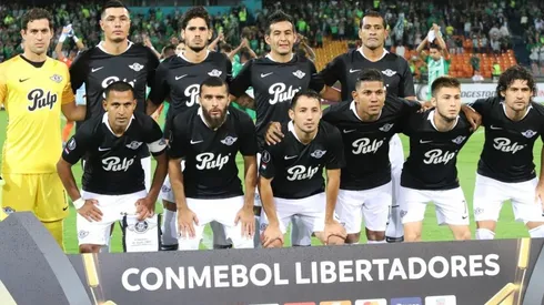 Libertad frente a Atlético Nacional en Medellín.