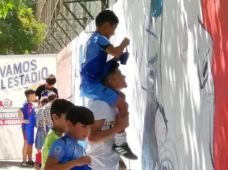 Niños pintaron un simbólico mural de apoyo a la Selección Chilena en Pinto Durán
