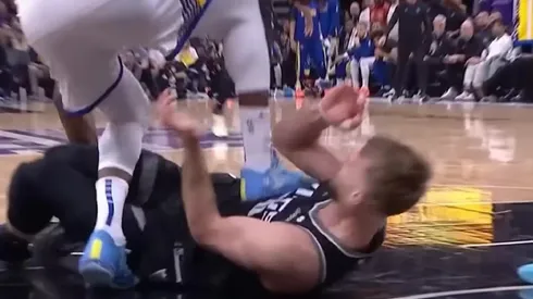 Draymond Green pisa a Sabonis