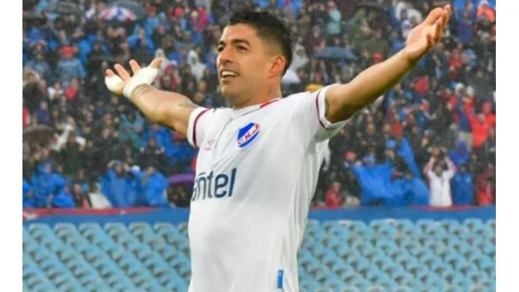 Lucho Suárez celebra frente a Liverpool