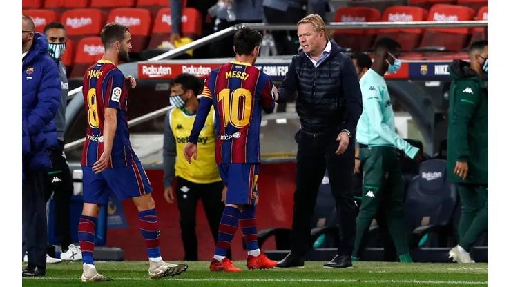 Koeman junto a Lionel Messi