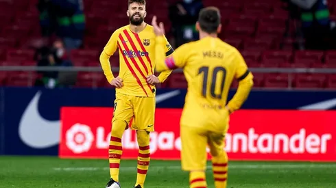Gerard Piqué y Lionel Messi ante el Atlético Madrid