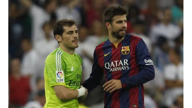 Casillas y Piqué en un derbi.