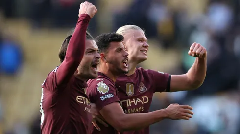 Jack Grealish, Matheus Nunes y Erling Haaland festejan contra Wolverhampton, en la Premier League 2024/25.
