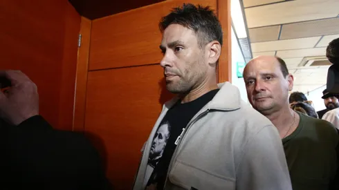 Mauricio Valenzuela detrás de Claudio Valdivia en la audiencia de formalización de Jorge.