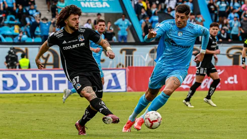 Maximiliano Falcón y Steffan Pino en el último enfrentamiento entre Deportes Iquique y Colo Colo, en la jornada 14 del Campeonato Nacional 2024.