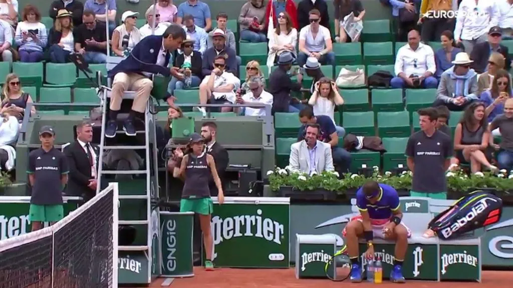 Carlos Ramos y Rafael Nadal.