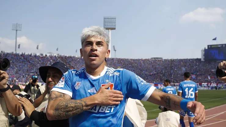 Maxi Guerrero festeja un gol que le anotó a Everton en el Nacional.