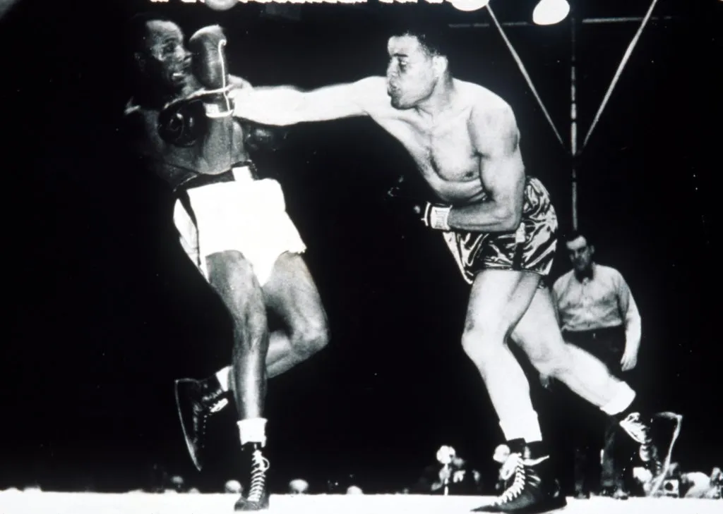 Joe Louis (derecha en la imagen) es el mejor boxeador peso pesado de la historia para George Foreman. (Foto: Allsport UK)