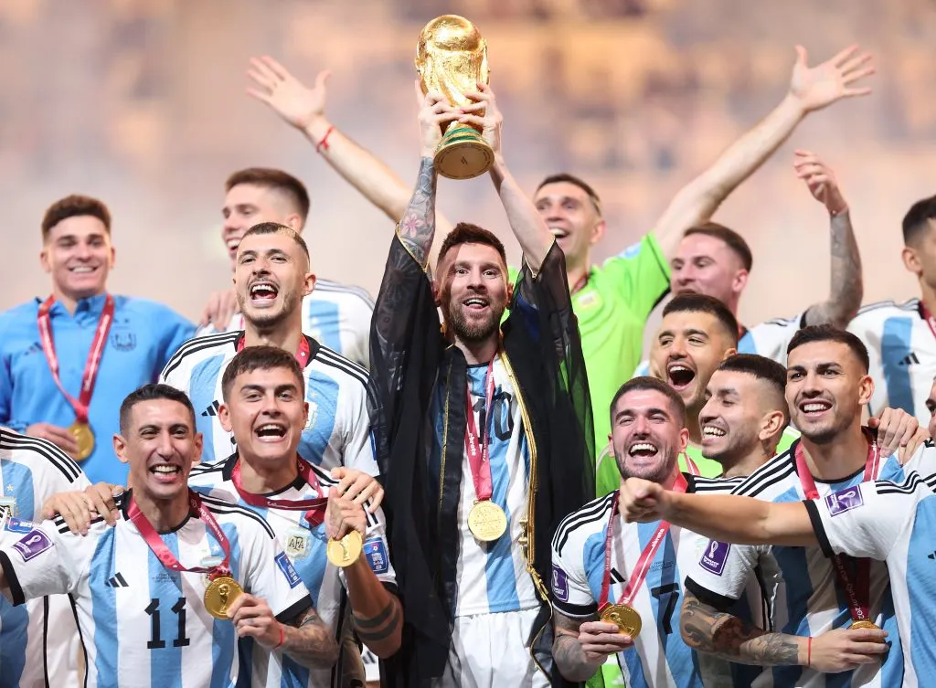 LUSAIL CITY, QATAR – DECEMBER 18: Lionel Messi of Argentina lifts the FIFA World Cup Qatar 2022 Winner’s Trophy during the FIFA World Cup Qatar 2022 Final match between Argentina and France at Lusail Stadium on December 18, 2022 in Lusail City, Qatar. (Photo by Julian Finney/Getty Images)