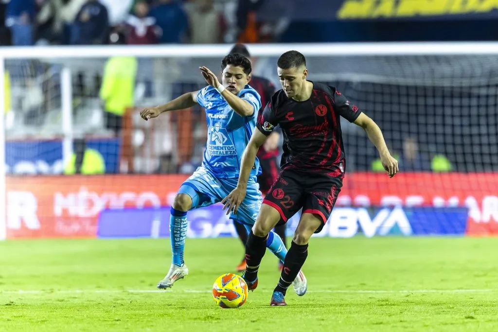 Joaquín Fernández (derecha) durante su paso por el Tijuana. (Foto: Francisco Vega/Getty Images)