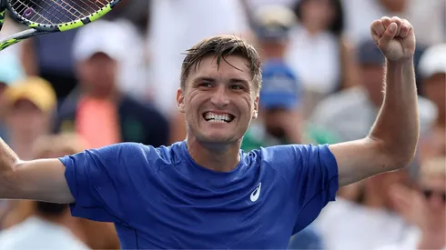 Raphael Collignon celebra su victoria ante Casper Rudd en el US Open