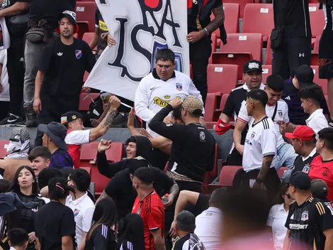 A los cuchillazos: hinchas de Colo Colo pelean en el Nacional