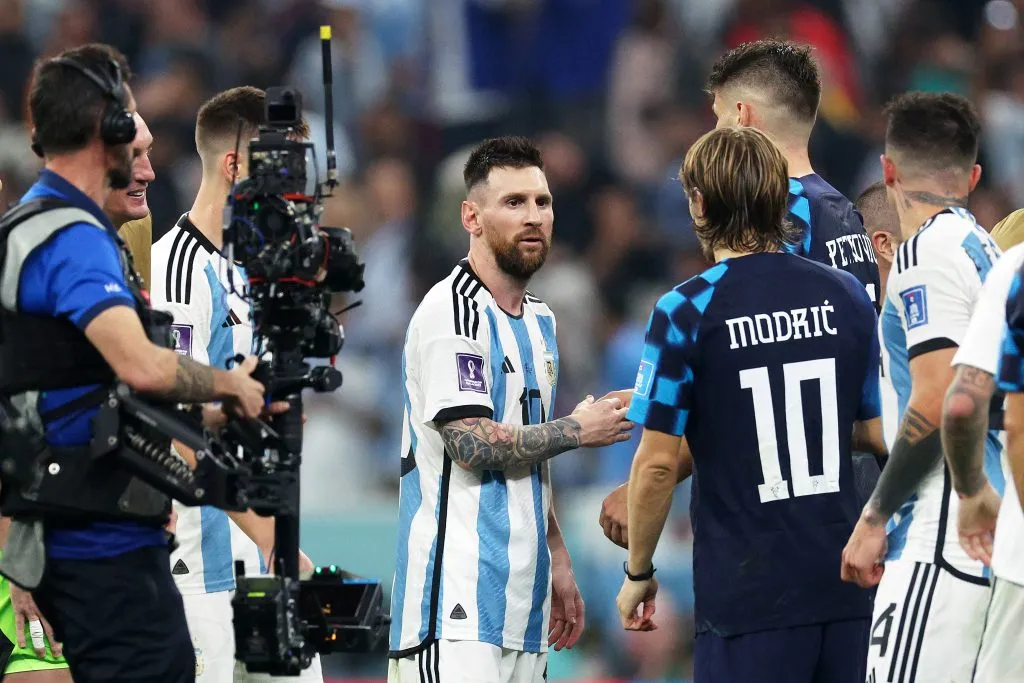 LUSAIL CITY, QATAR – DECEMBER 13: Lionel Messi of Argentina and Luka Modric of Croatia shake hands after the FIFA World Cup Qatar 2022 semi final match between Argentina and Croatia at Lusail Stadium on December 13, 2022 in Lusail City, Qatar. (Photo by Richard Heathcote/Getty Images)