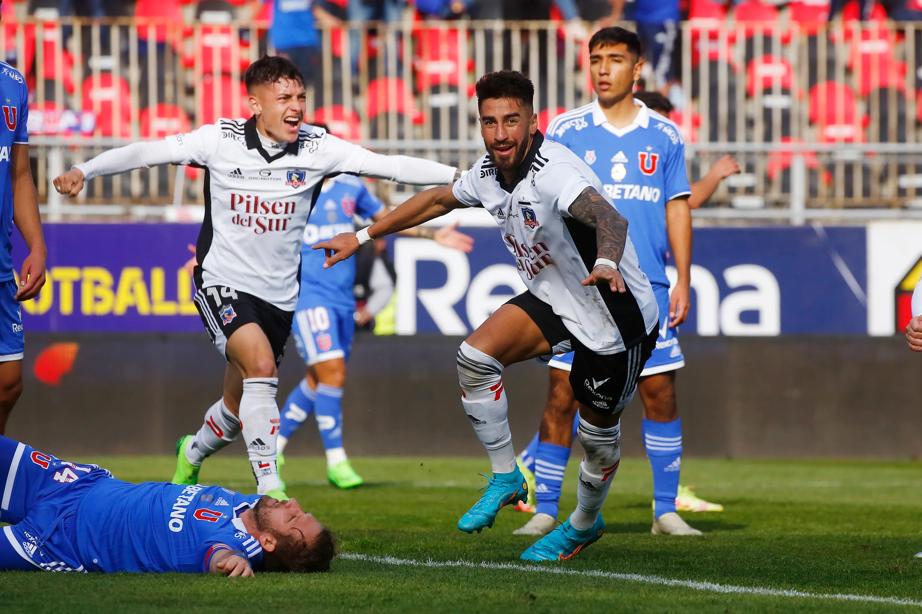 Para Johnny Herrera, Juan Martín Lucero es bienvenido en la U por haberse ido en mala de Colo Colo. Foto: Photosport.