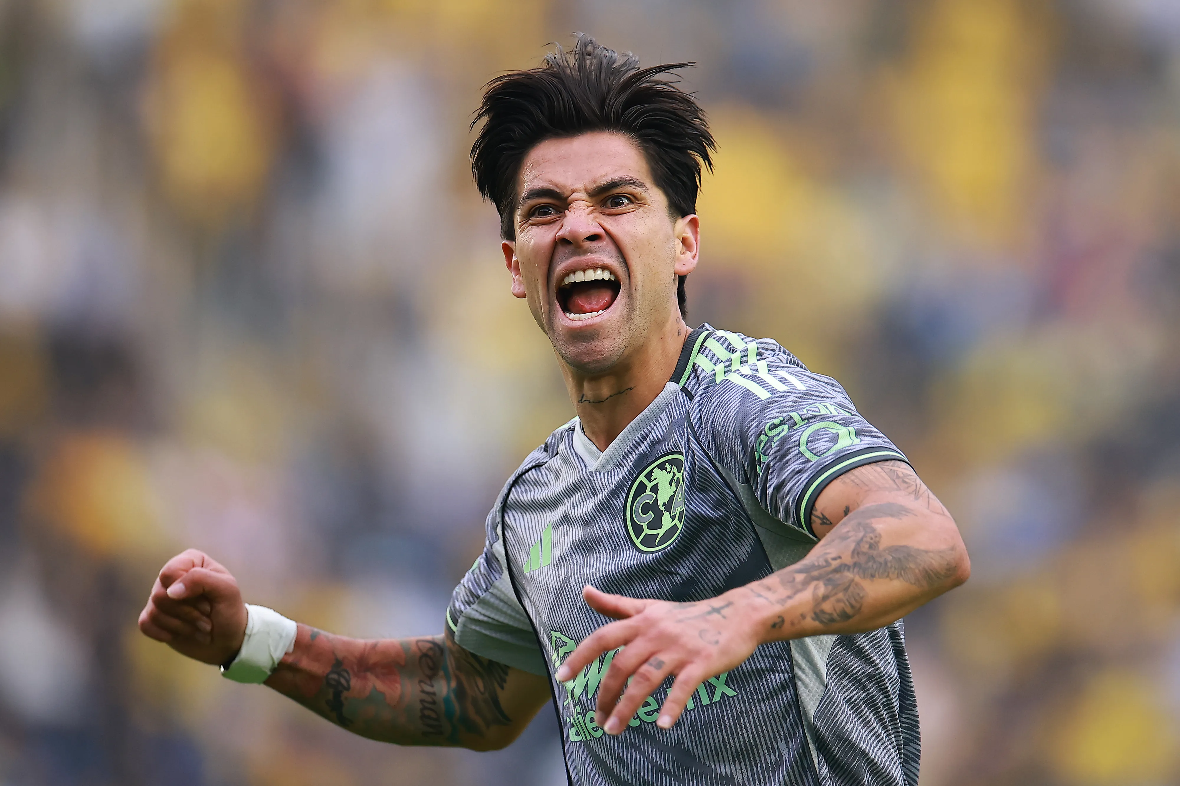 Víctor Dávila celebró así su gol ante el Necaxa. (Manuel Velasquez/Getty Images).