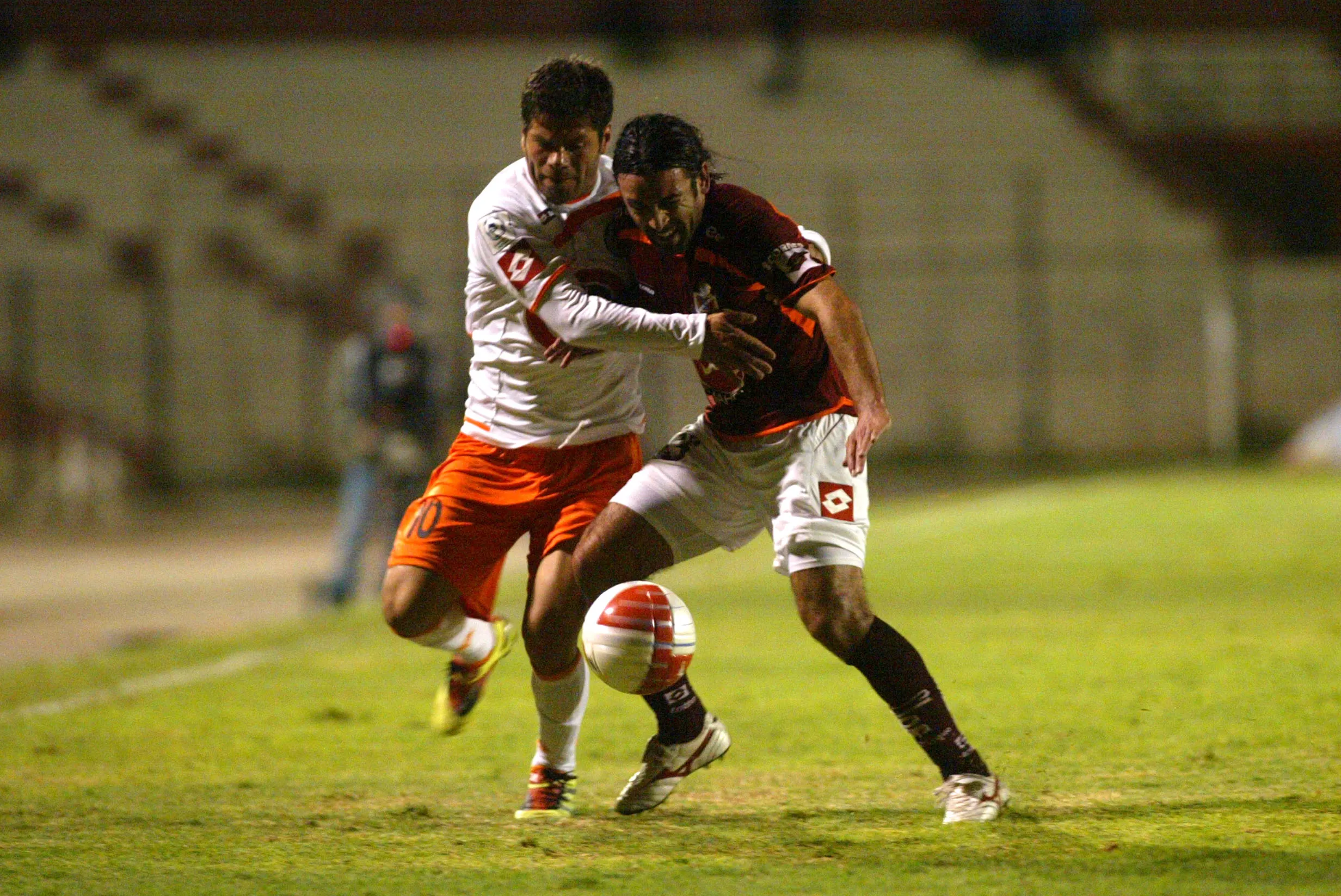 Sergio Vargas, el gran socio que tuvo Ángel Carreño en la zona media granate. (Hernán Contreras | Photosport).